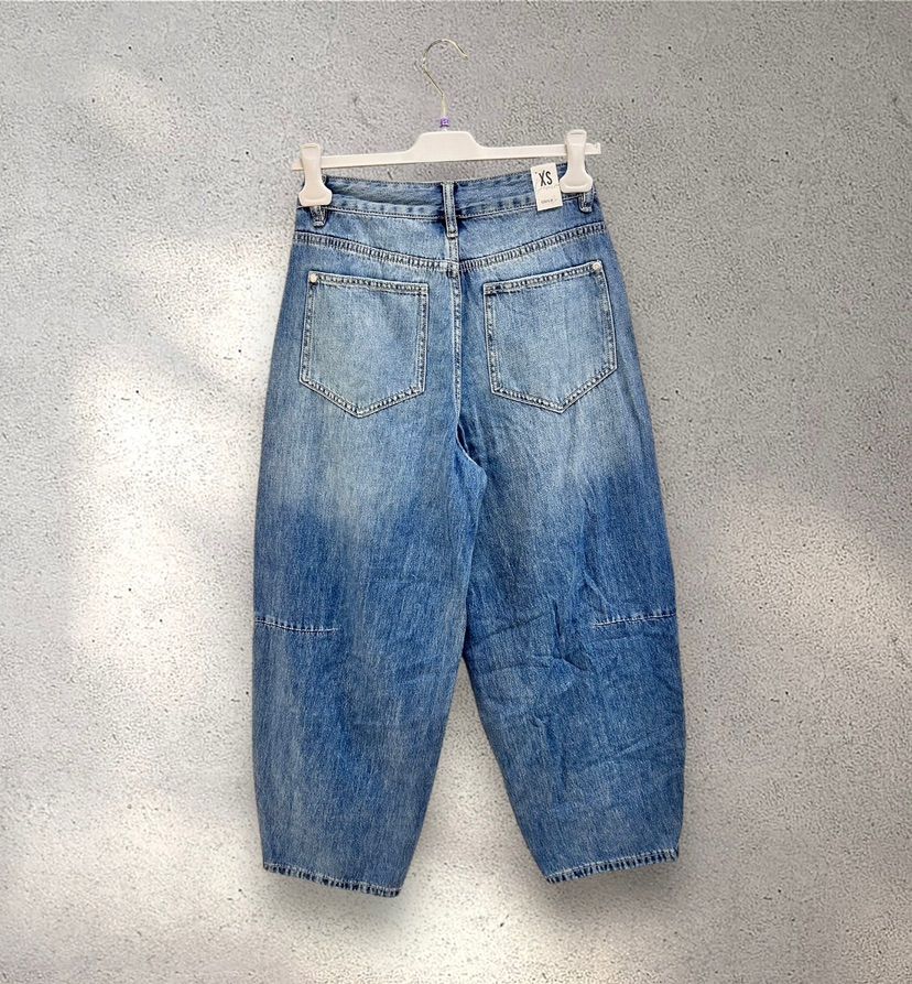 Blugi cu picior larg